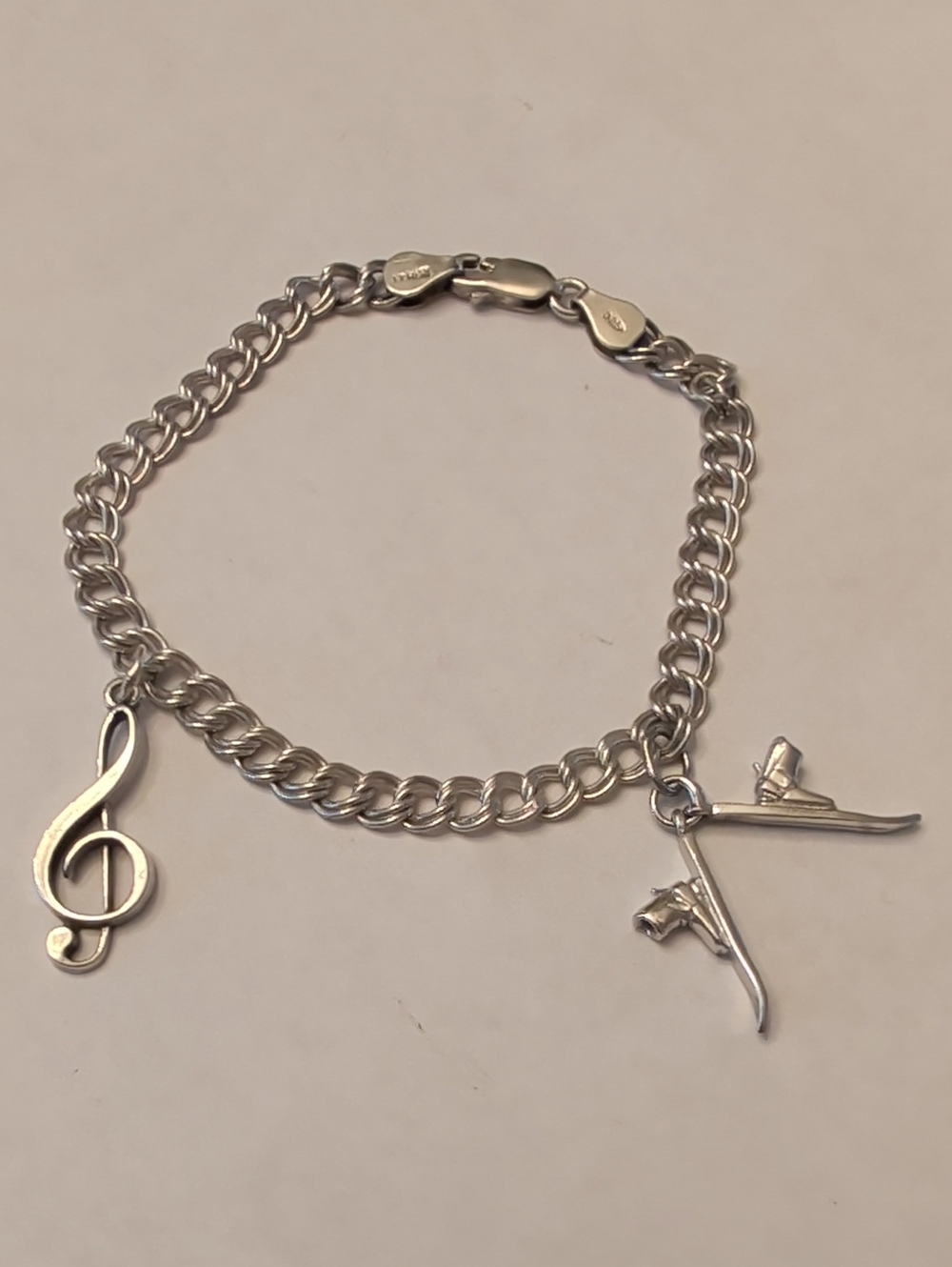 Sterling Silver Charm Bracelet with Music And Ski Charms